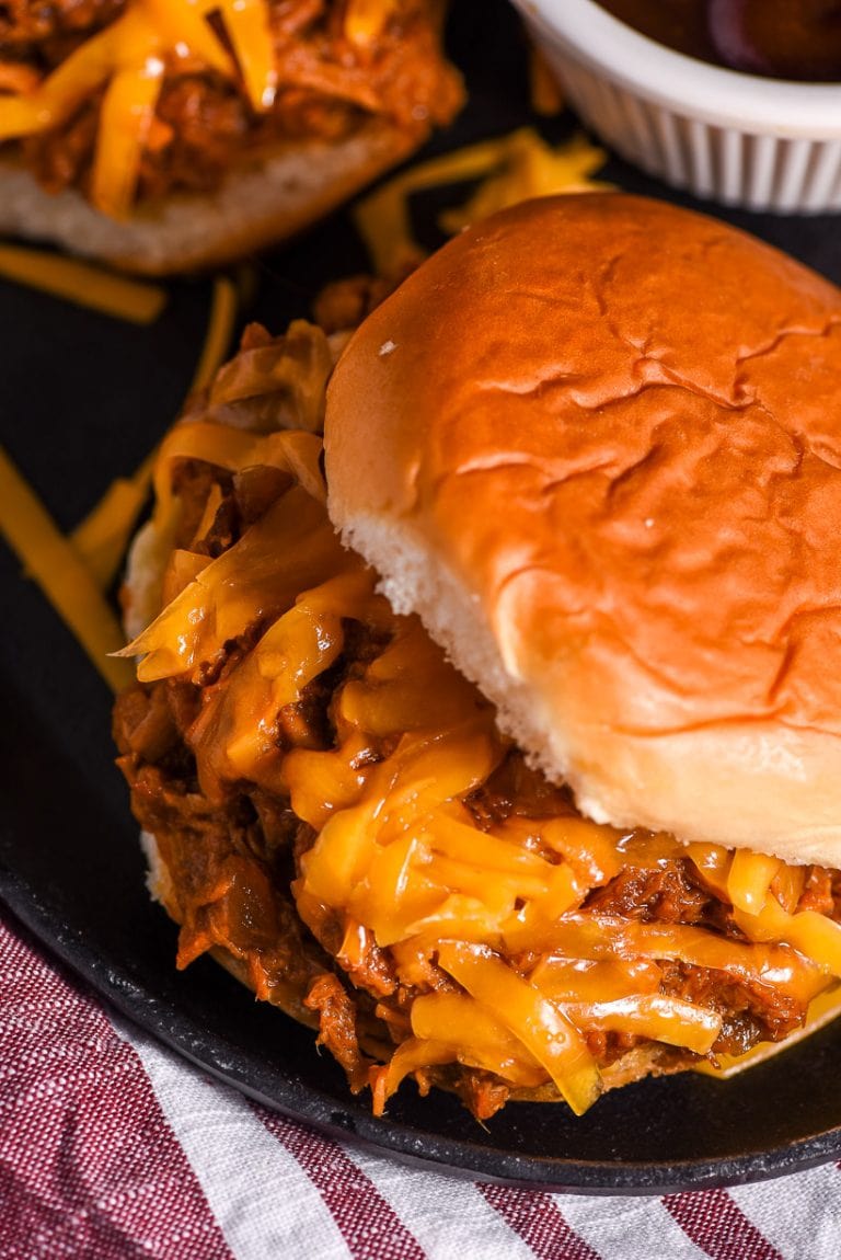 Slow Cooker Barbecue Chicken Sandwiches on a black plate