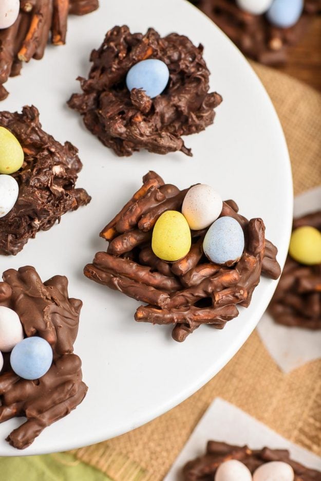 Chocolate Birds Nests with cadbury chocolate eggs on a white platter