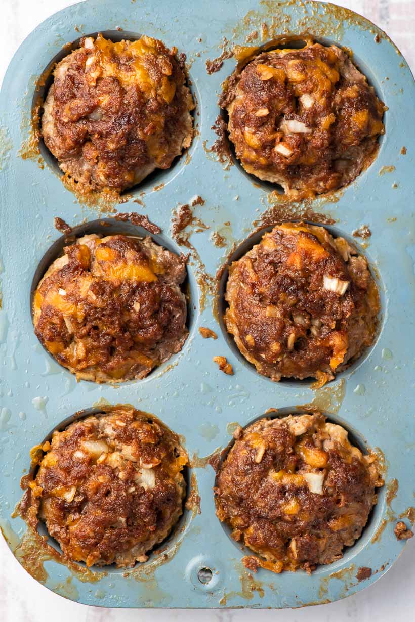 meatloaf muffins in a blue muffin tin