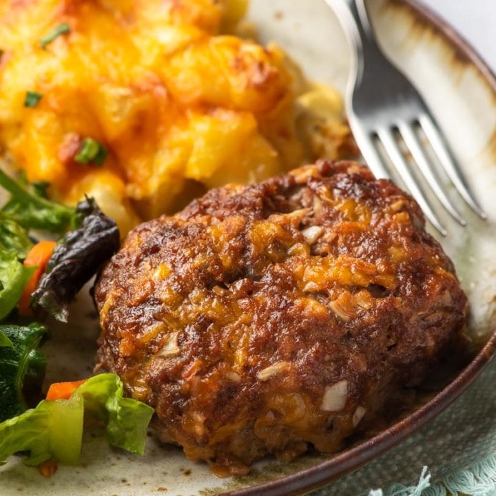 mini meatloaf recipe on a plate with fork and potatoes