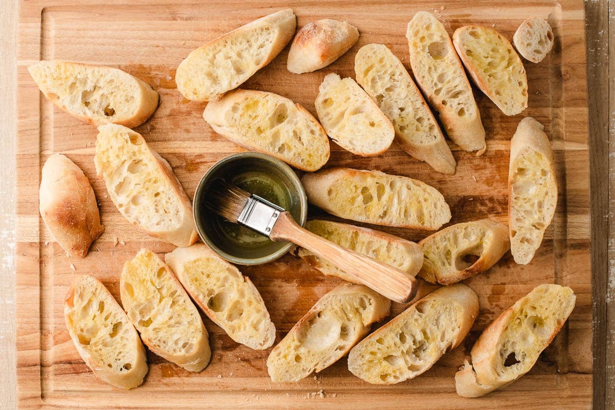 French baguette slices brushed in olive oil.