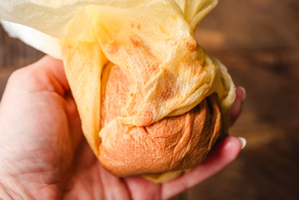 Pumpkin puree wrapped in paper towels so that moisture is absorbed.