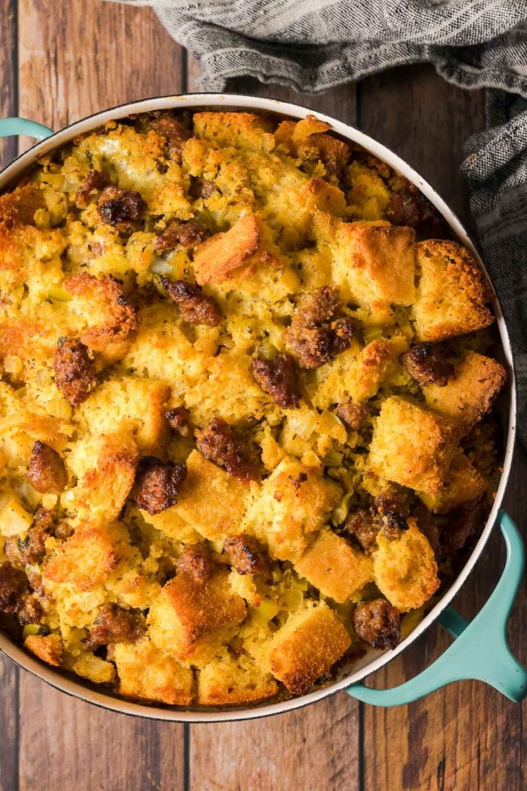 Gluten free cornbread dressing in a round casserole dish.