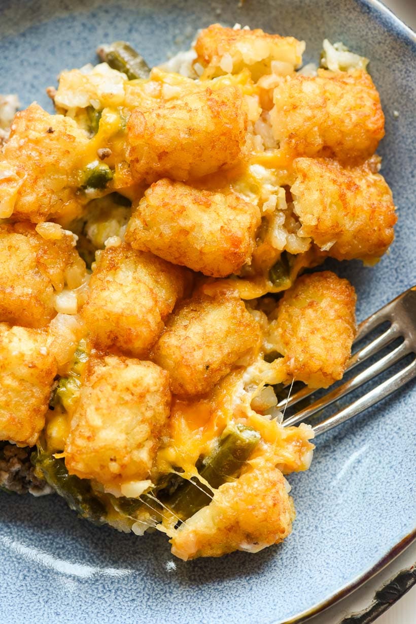 Overhead view of tater tot casserole with a fork