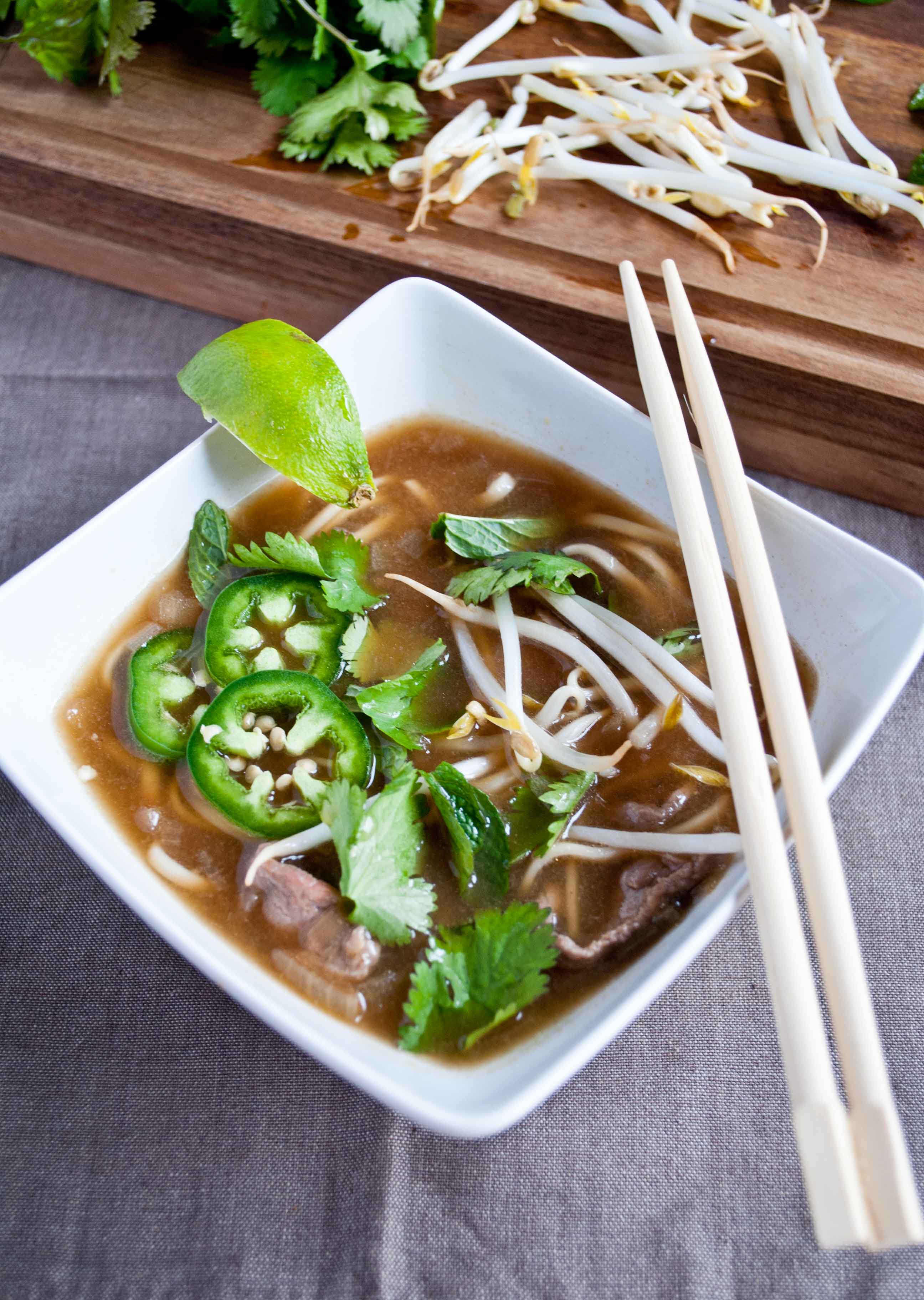Pho Bo (Vietnamese Red meat and Noodle Soup  Pho Bo (Vietnamese Red meat and Noodle Soup) f Pho finished overhead
