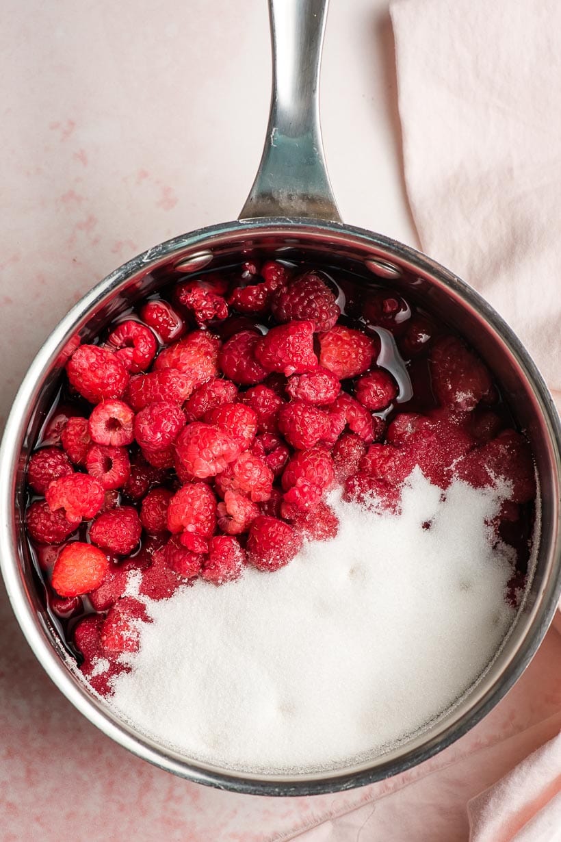 raspberry and sugar in a sauce pan