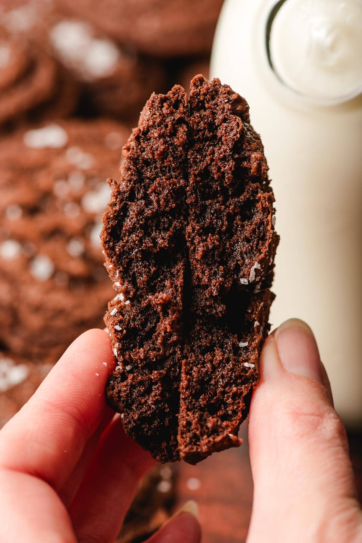 Halved brownie cookie, showing the fudgy interior.