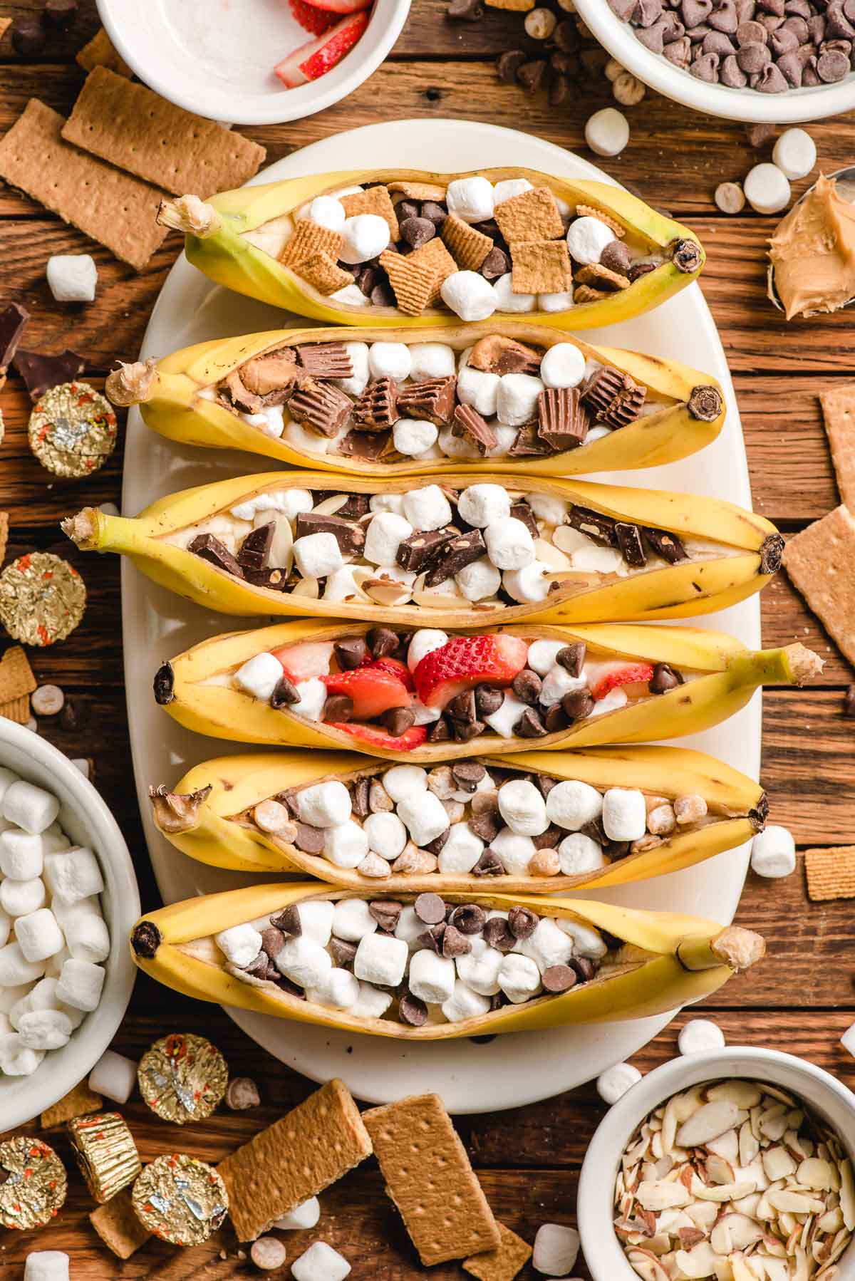 Six bananas, sliced down the middle to form a boat, then stuffed with marshmallows and chocolate.