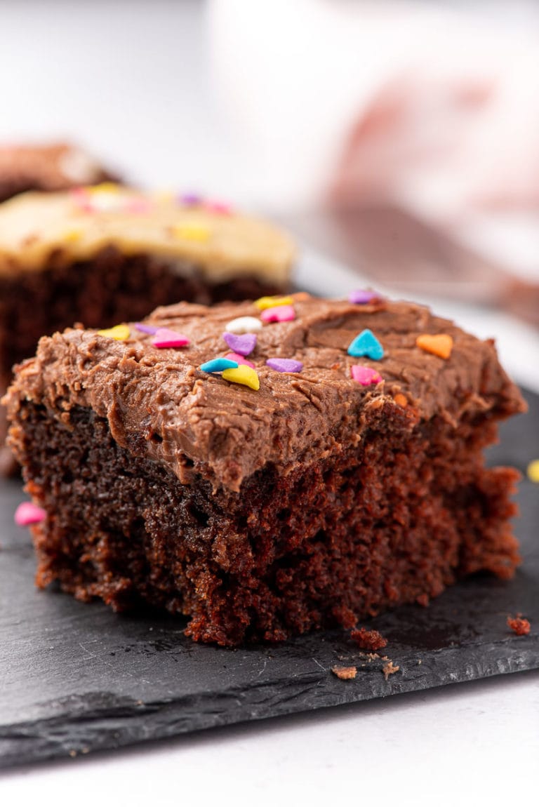 slice of fluffy chocolate crazy cake with chocolate frosting