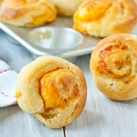 Garlic Cheddar Swirled Brioche Rolls (No Knead!)