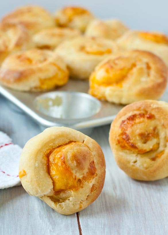 Cheddar Swirled Brioche Rolls made with only 30 minutes prep and no kneading!