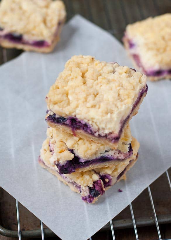 Berry Cheesecake Crumble Bar- Buttery shortbread crust, berry cheesecake filling, and a sweet crumble topping!