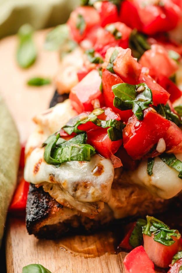 French bread topped with mozzarella cheese, chicken, and bruschetta.