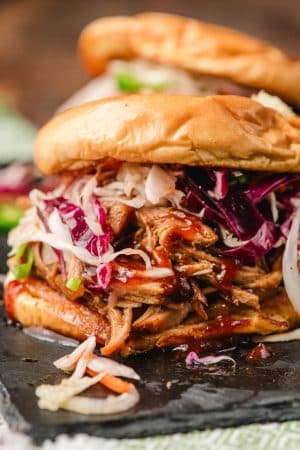 Sweet and spicy pulled pork sandwich with coleslaw.