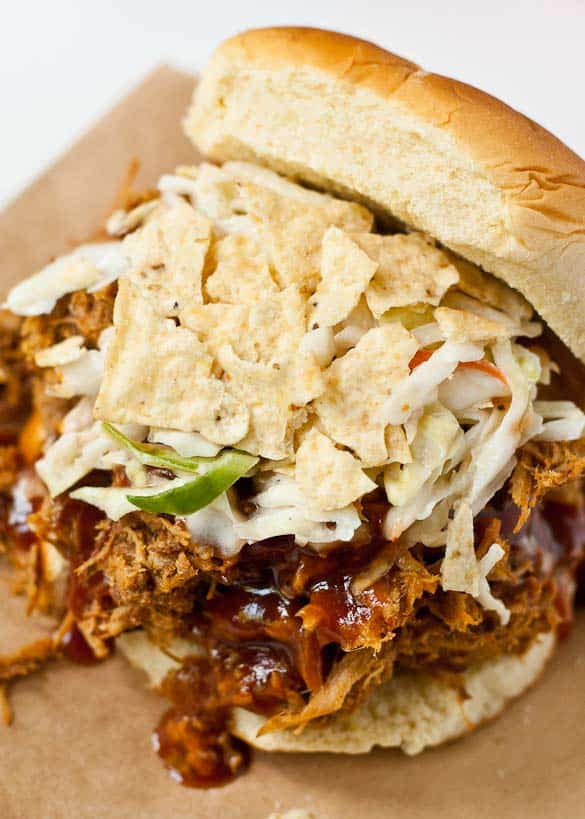 Easy Crock Pot Pulled Pork- Just 10 minutes prep is all you need to make tender, sweet and spicy pork!