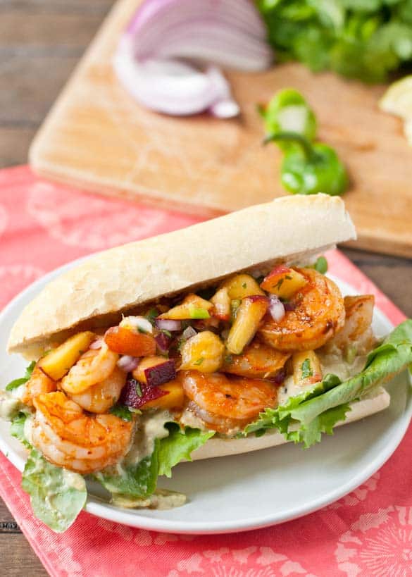 Smoky Chipotle Shrimp pairs beautiful with sweet and spicy peach salsa and avocado.