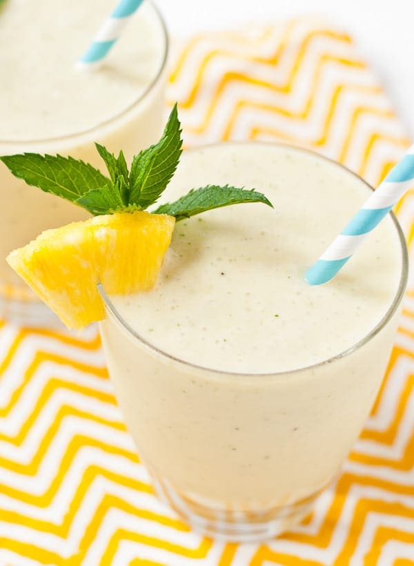 Tropical Mint Smoothies combine pineapple, spearmint, and coconut milk for a refreshing summer drink.