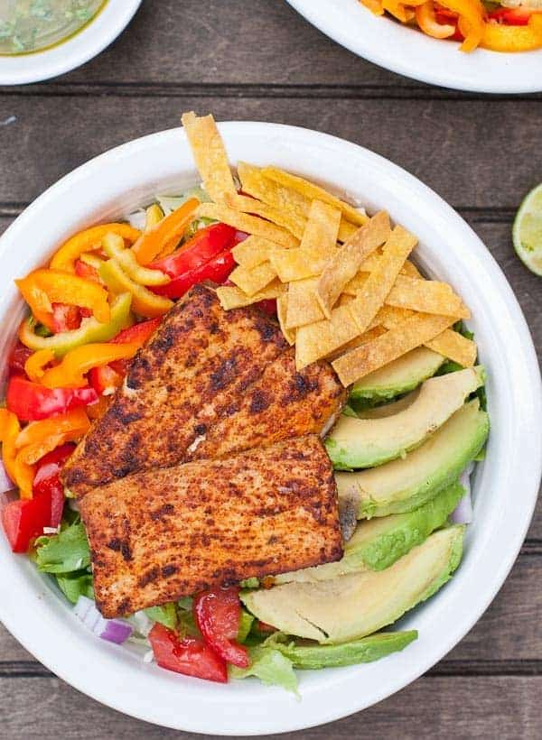 Fish Taco Salad Bowls with a creamy Sriracha Lime Dressing!