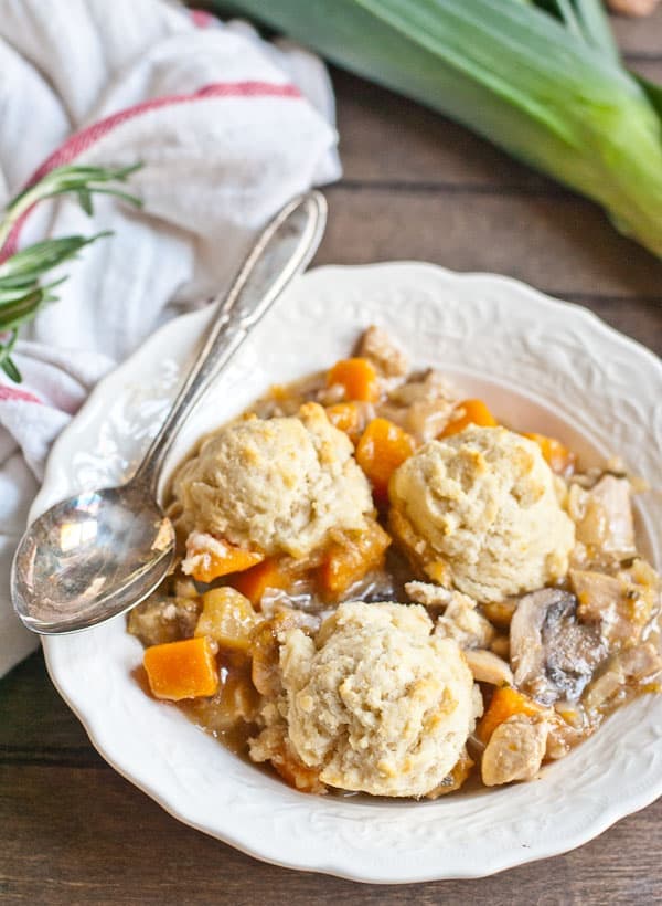 A mixture of chicken, butternut squash, leeks, and mushrooms make the filling for this comforting biscuit casserole. 