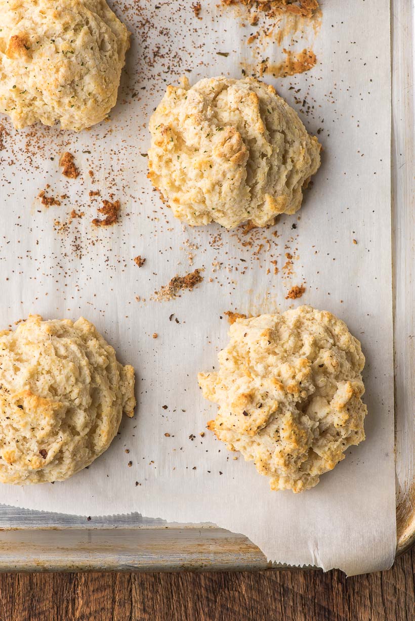 baked drop biscuits on a sheet pan