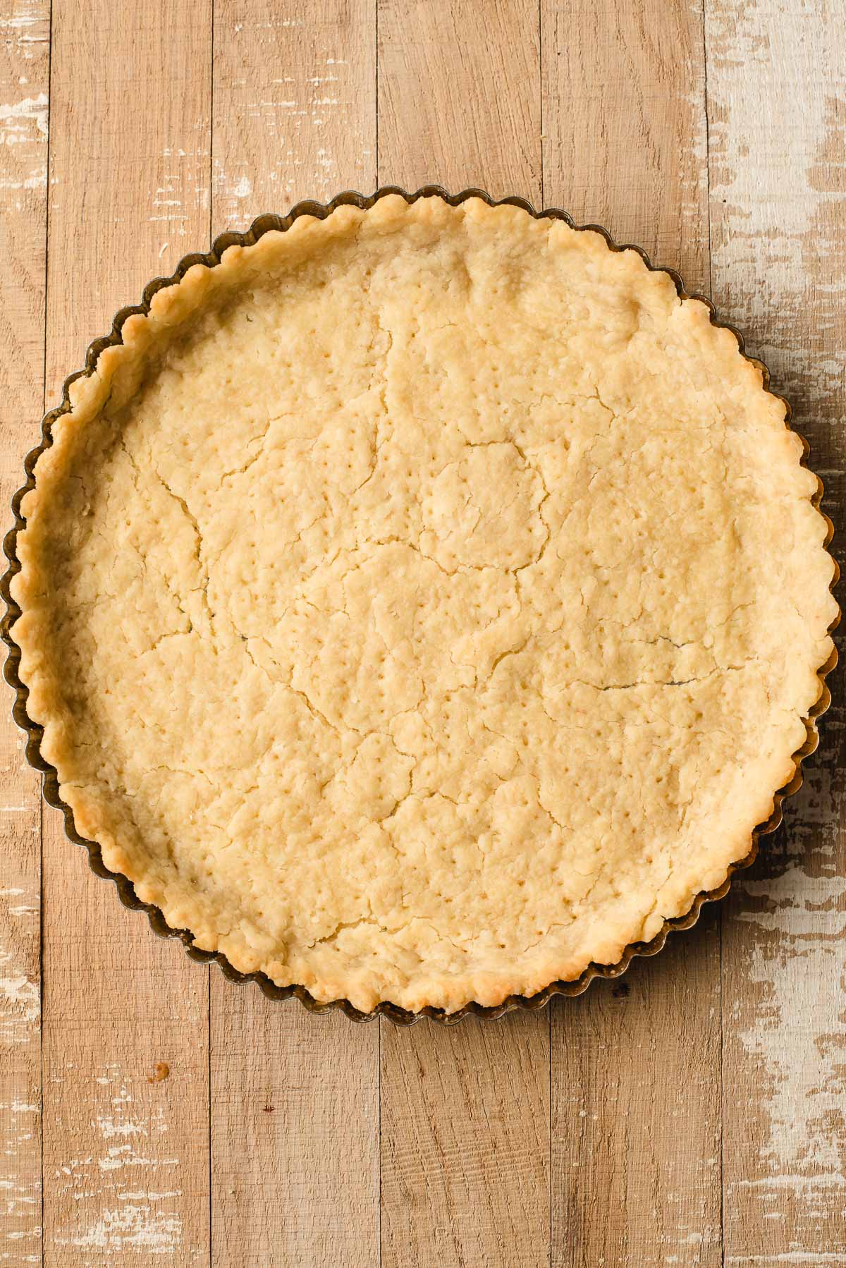 Tart dough blind baked in the oven.