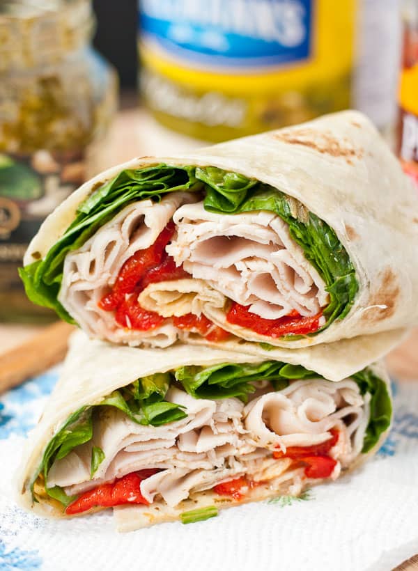 This Spinach, Roasted Red Pepper, and Feta Turkey Wrap will get you out of your sandwich rut!