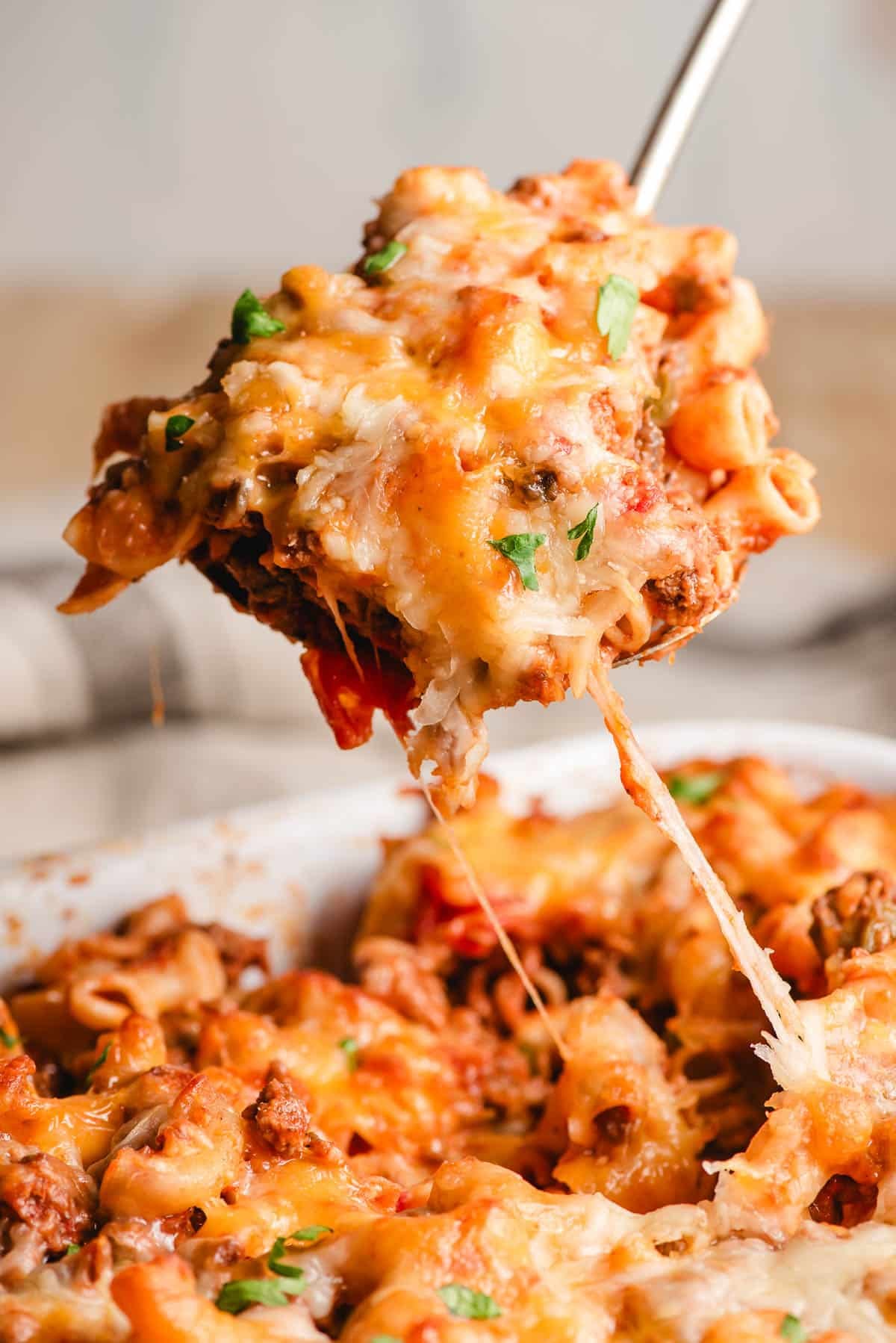 Scoop of Johnny Marzetti on a serving spoon.