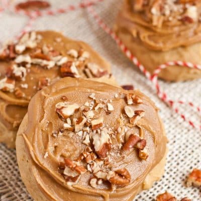 Two maple pecans cookies on a burlap background