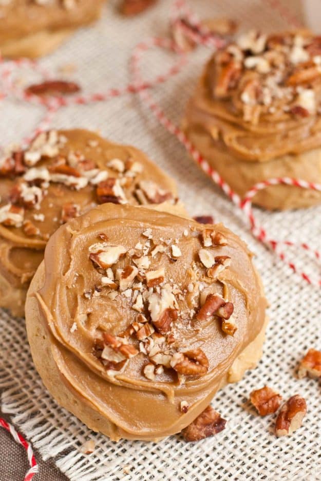 Two maple pecans cookies on a burlap background