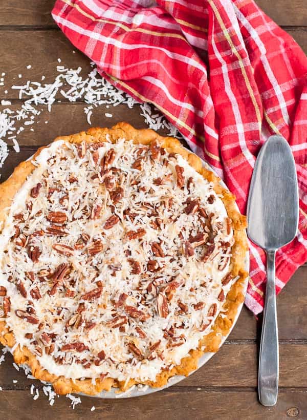 Toasted pecans and coconut top this unique cream cheese pie!