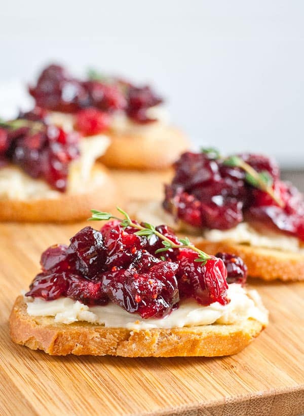 These Roasted Balsamic Cranberry Brie Crostinis are the perfect holiday party appetizer!