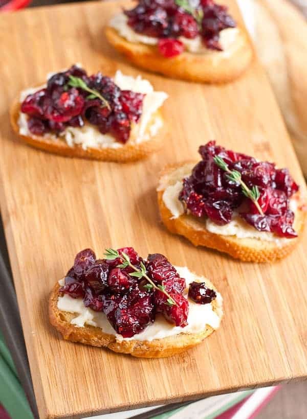 Roasted Balsamic Cranberry Brie Crostini are an easy, stunning holiday party appetizer. 