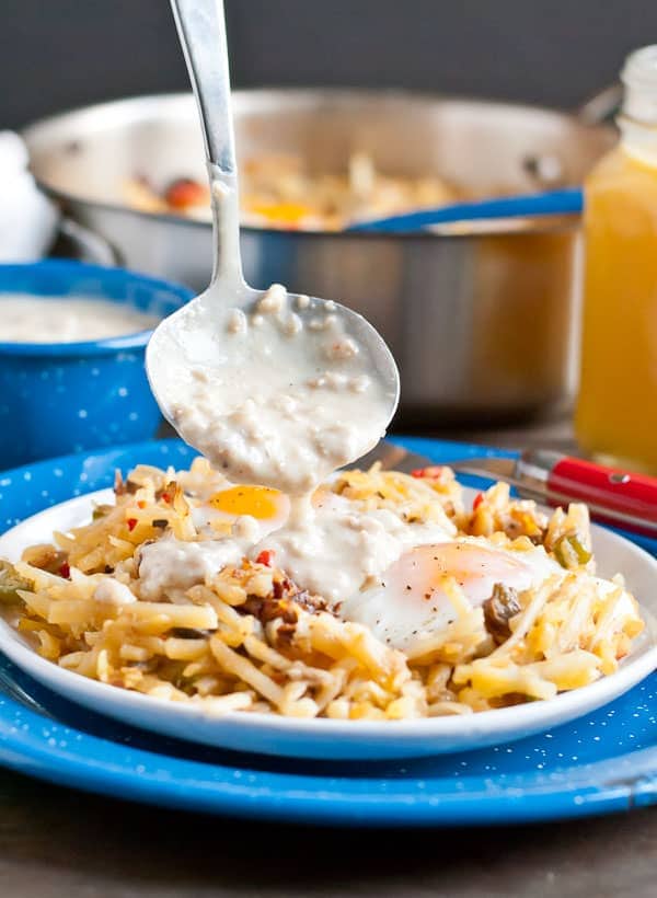 Hash browns and eggs topped with creamy sausage gravy! It's the ultimate holiday breakfast!