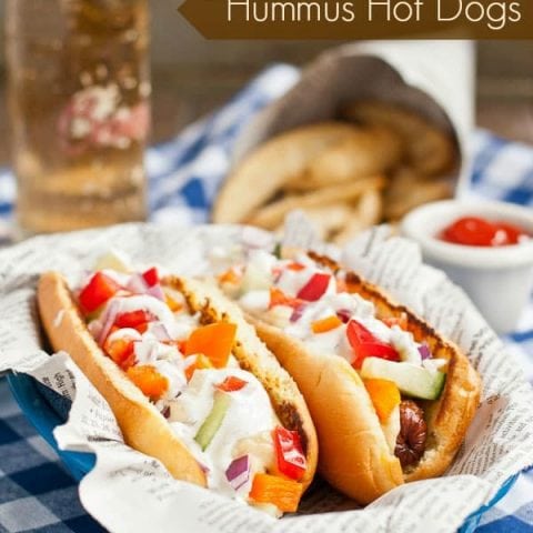Step up your hot dog game with these fresh and flavorful Greek Hummus and Tzatziki Hot Dogs!