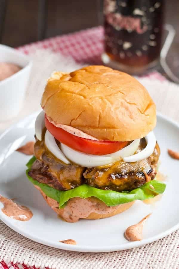 Smoky Cajun Burgers with a killer sweet and spicy Cajun sauce!