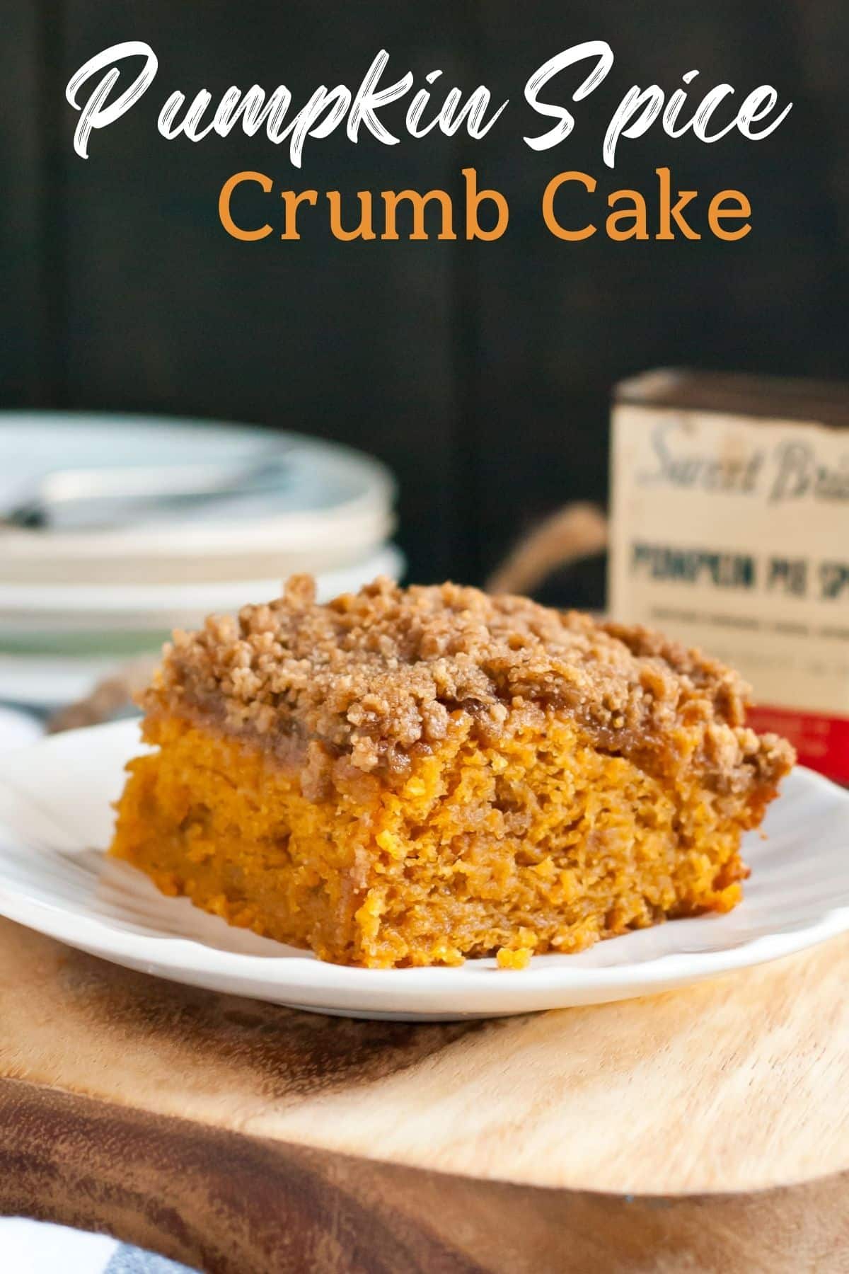 Slice of pumpkin crumb cake on a white plate