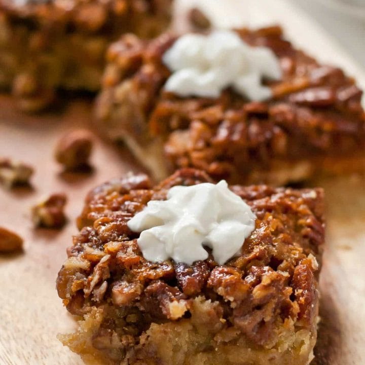 These ooey gooey Pecan Pie Bars are the perfect Thanksgiving dessert.