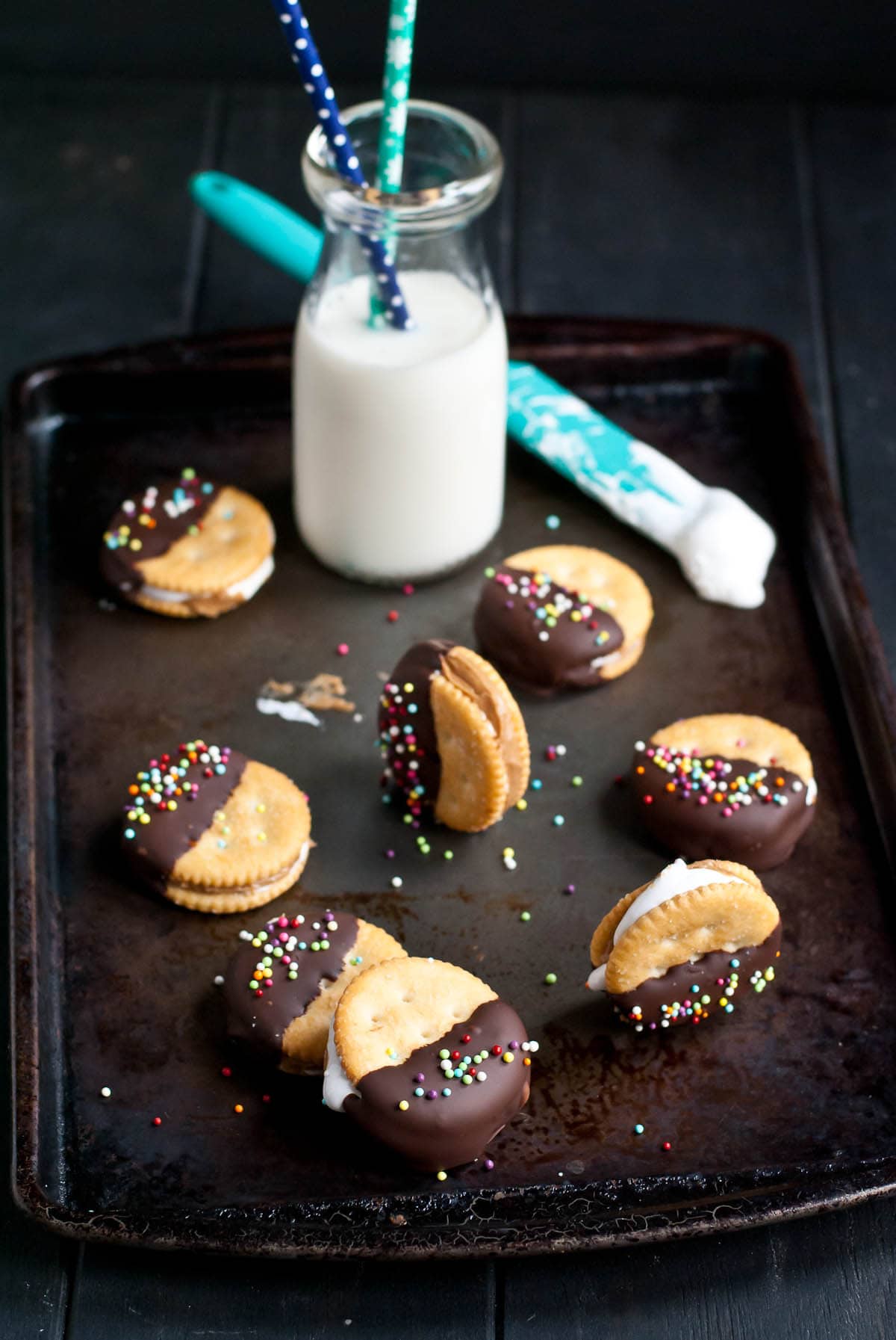 Chocolate Dipped Fluffernutter Ritz Cookies are a party favorite. With only four ingredients you probably already have in the pantry, these are a cinch to make!