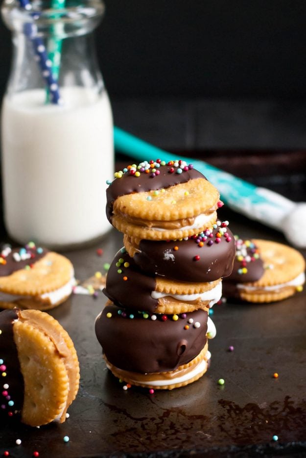 These Chocolate Dipped Fluffernutter Ritz Cookies are only four ingredients and SO delicious!