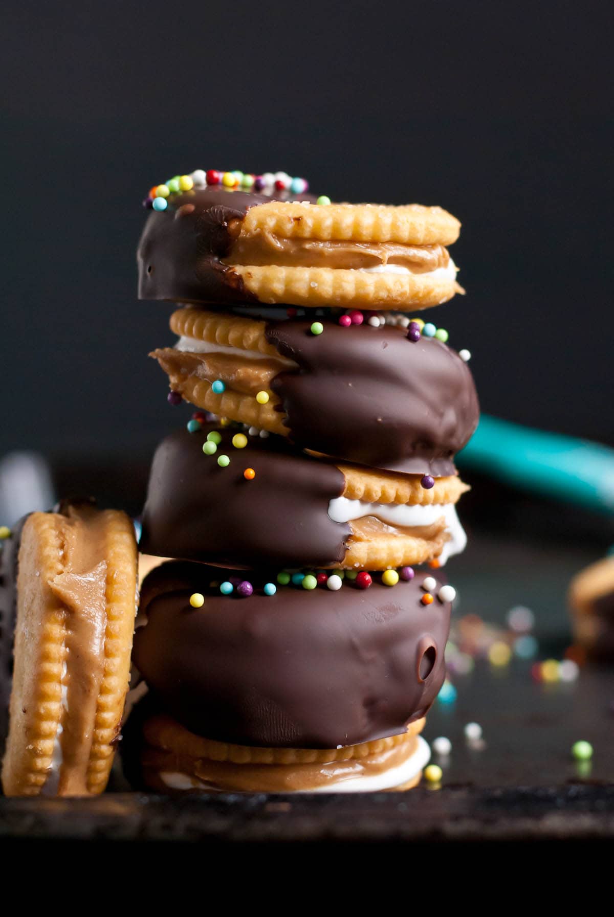 These four ingredient Chocolate Fluffernutter Ritz Cookie Sandwiches are the perfect treat for holiday parties!