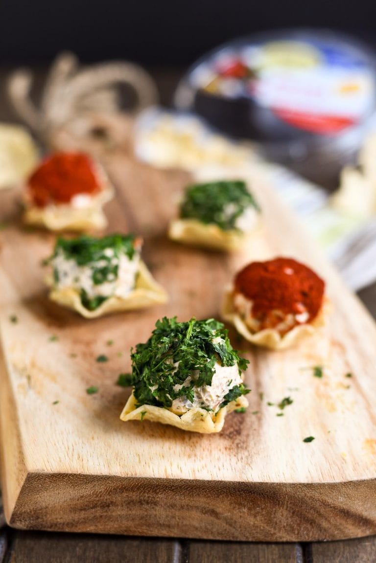 These adorable Spicy Tex Mex Mini Cheese Balls are nestled in a tortilla scoop for the perfect party bite!