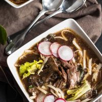 This Slow Cooker Asian Beef and Mushroom Soup recipe is loaded with garlic, ginger, and Sriracha for a warm and comforting weeknight meal.