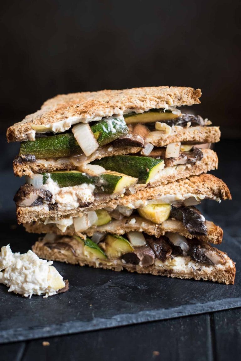 This is no ordinary veggie sandwich recipe! Loaded with roasted portabello mushrooms, zucchini, onion, and a creamy spread, this sandwich will satisfy the heartiest of appetites!