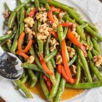 These Honey Green Beans with Red Pepper and Walnuts are a 10 minute side dish for busy weeknights!