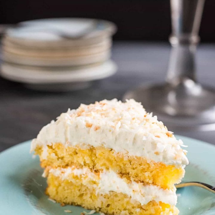 This Pineapple Coconut cake i loaded with fresh pineapple and tastes like a giant pina colada!