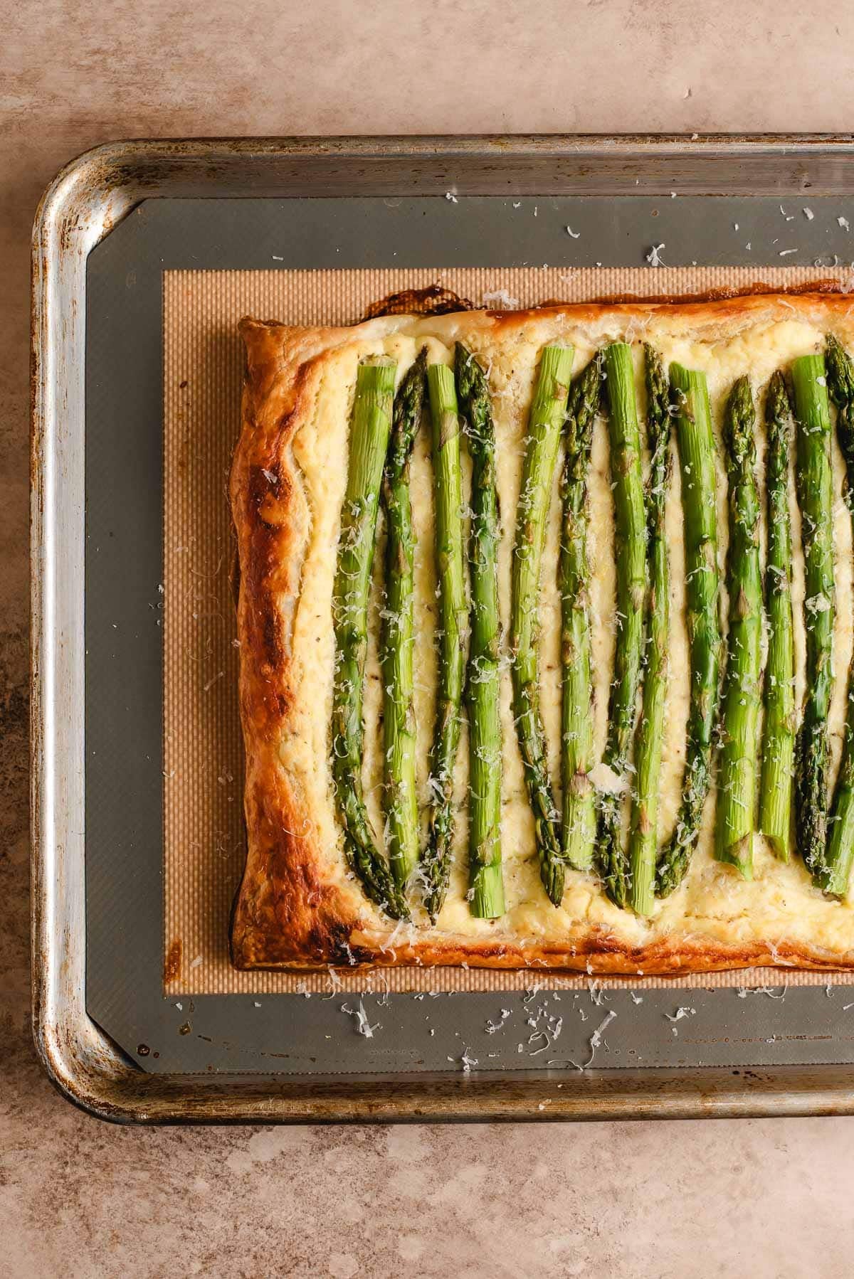 overhead shot of baked parmesan asparagus tart.