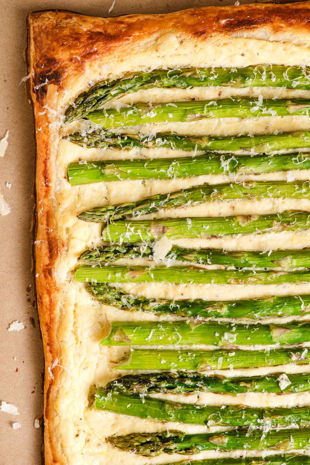 Puff Pastry parmesan and asparagus tart with ricotta cheese.