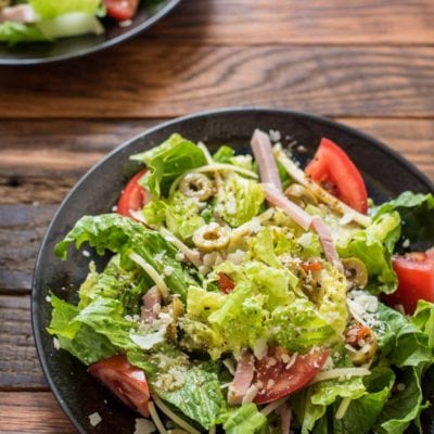 Made famous by Columbia restaurant, this 1905 Salad with ham, swiss, and garlic dressing is worthy of all its fame!