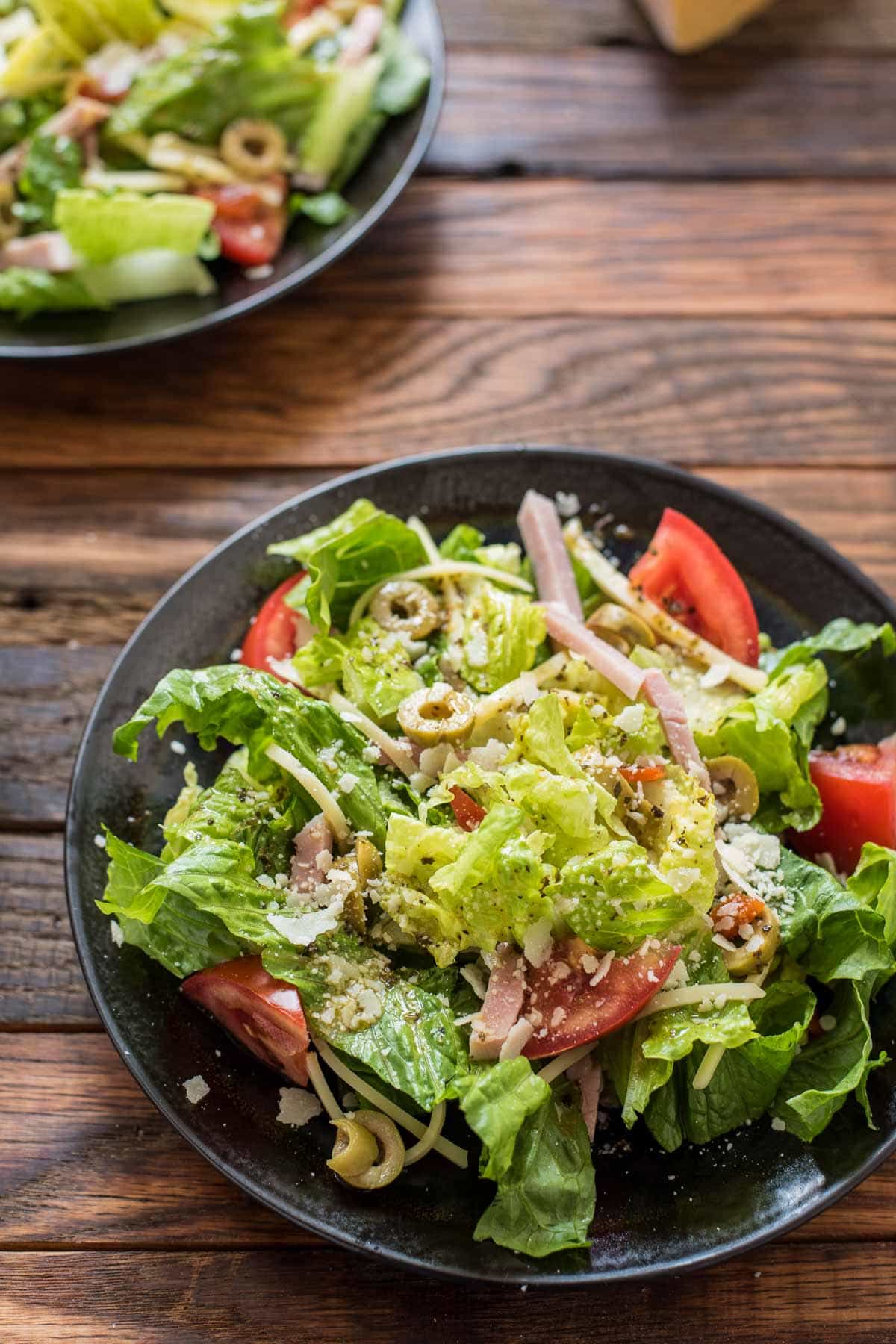 Made famous by Columbia restaurant, this 1905 Salad with ham, swiss, and garlic dressing is worthy of all its fame!