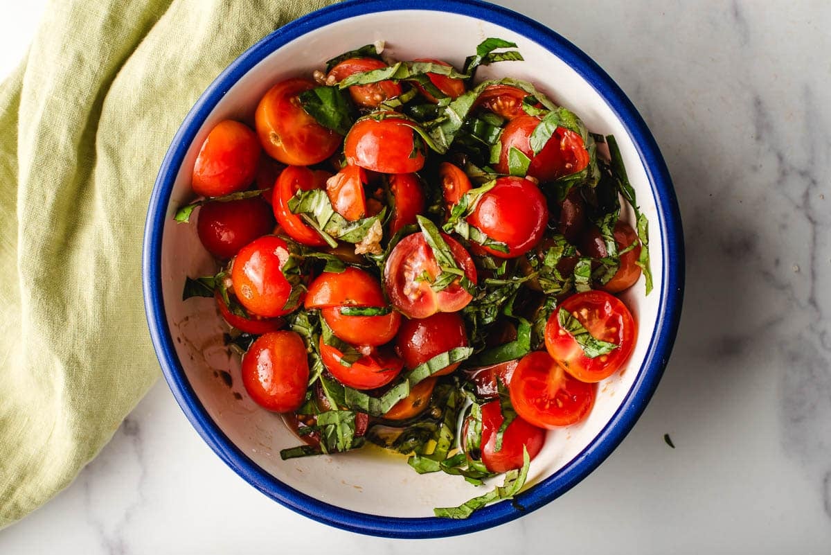 Cherry tomatoes tossed with balsamic vinegar, olive oil, garlic, and fresh basil.